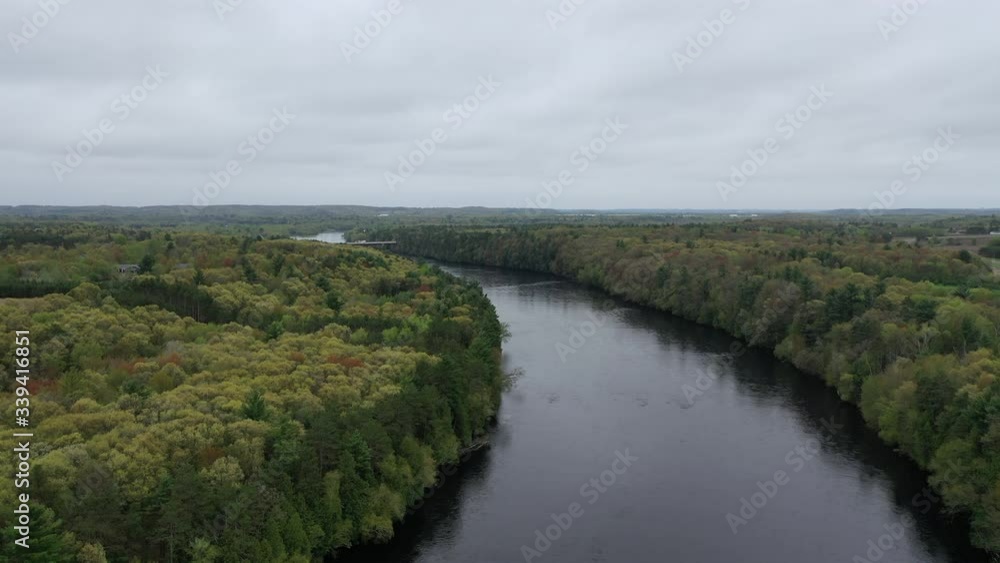 Drone over river on overcast day. Drone over river on overcast day.