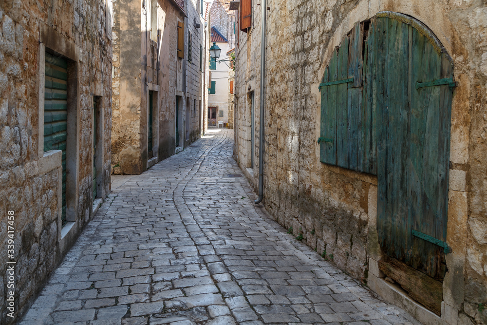 STARI GRAD / ITALY - AUGUST 2015: Street in the historic centre of Stari Grad town on Hvar island, Croatia