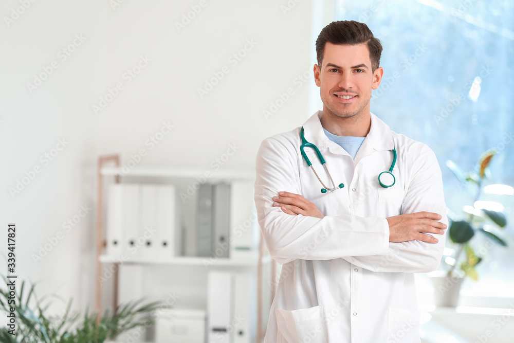 Portrait of young male doctor in clinic Portrait of young male doctor in clinic