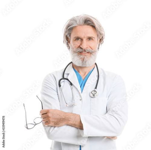 Portrait of senior male doc...
