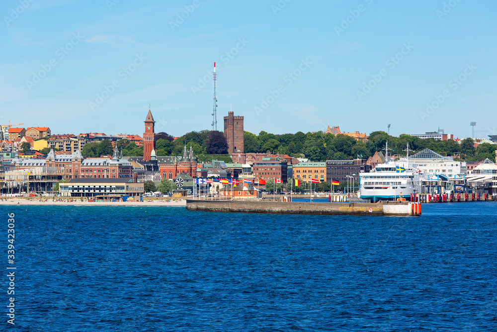 View from the sea of the city, Helsingborg City Hall, passenger ferry in the port, Helsingborg, Sweden