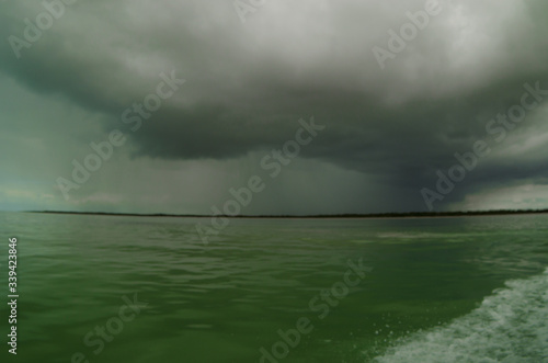 storm clouds over the river