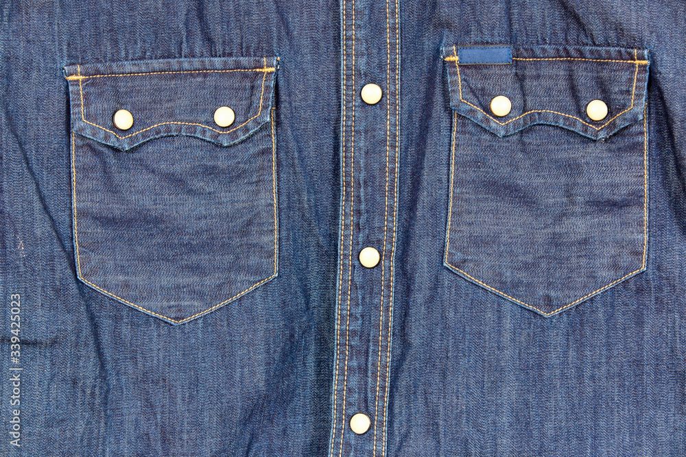 Close-up of dark blue denim jeans background. Close-up of dark blue denim jeans background.