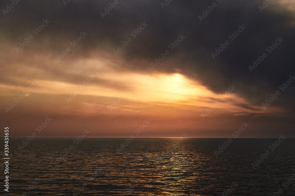 Sea sunset. Smoke wildfires sweeping across the sky. Sea sunset. Smoke wildfires sweeping across the sky.