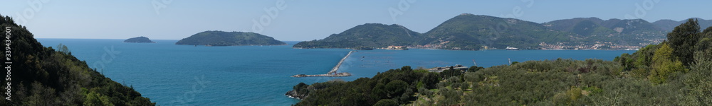 Panoramic photograph of the Ligurian sea in the Covid-19 coronavirus period. Gulf of La Spezia deserted without ships or boats. Panoramic photograph of the Ligurian sea in the Covid-19 coronavirus period. Gulf of La Spezia deserted without ships or boats.