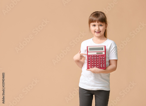 Little girl with calculator...