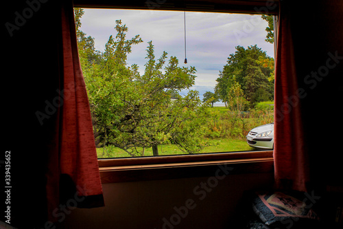 View from the camper van window of the wildlife. Spending a family carefree weekend in nature.