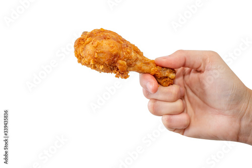 Fried chicken drumsticks on white background.