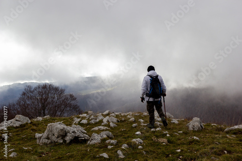 hiker on the top of a mountain