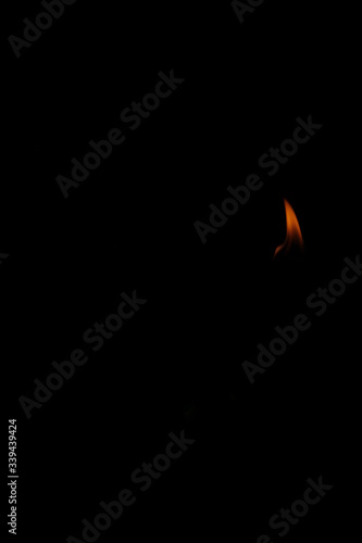 burning lamp on black background
