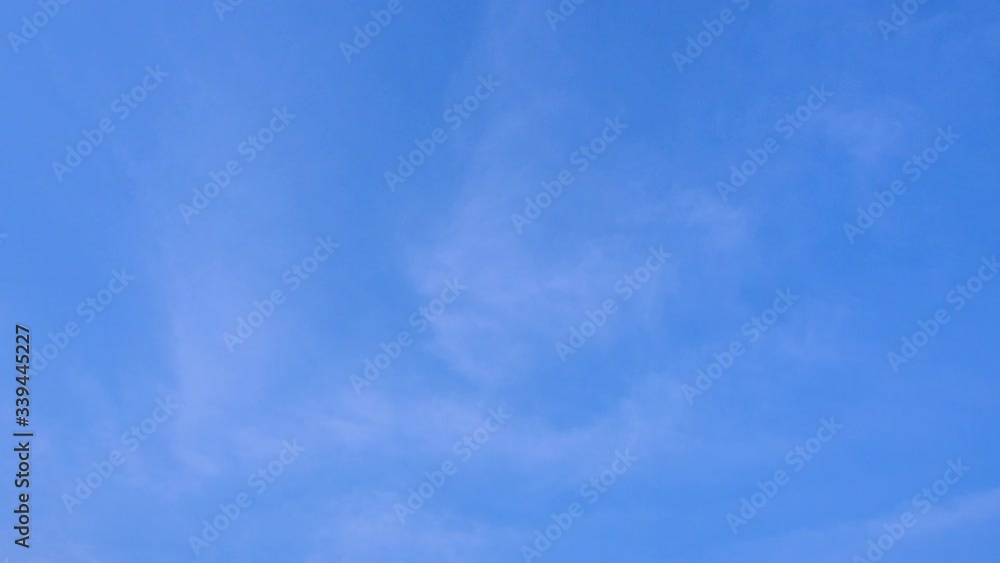Altostratus bluish-gray sheets of cloud are slowly move cover the blue sky in day time. Altostratus bluish-gray sheets of cloud are slowly move cover the blue sky in day time.