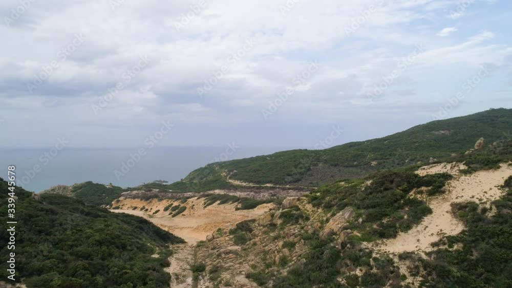 Aerial of Hon Ngang Beach at Dam Mon Peninsula, Van Phong Bay, Van Ninh, Khanh Hoa. 80km north of Nha Trang, is beautiful with its 10km untouched wilderness white sandy beach and crystal clear water