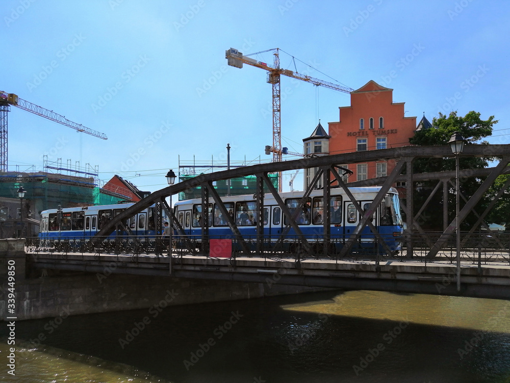 Trams on iron bridge