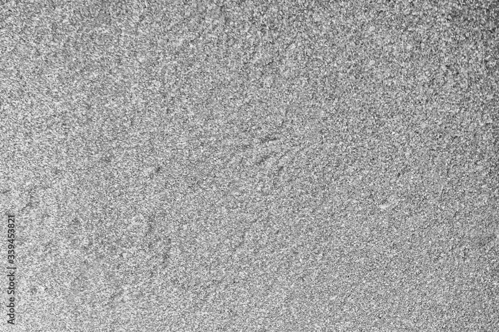 Obraz premium gray black and white grain background of wall , monochrome surface texture , asphalt backdrop close up