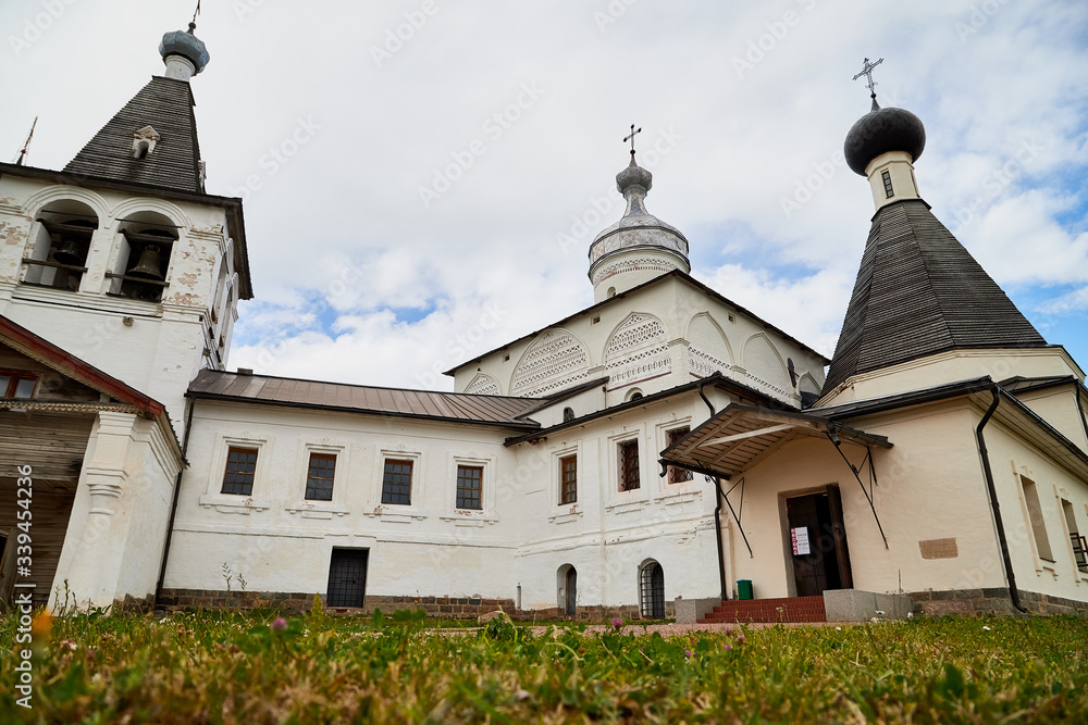 Wall and dome of Ferapontov monastery in a summer day
