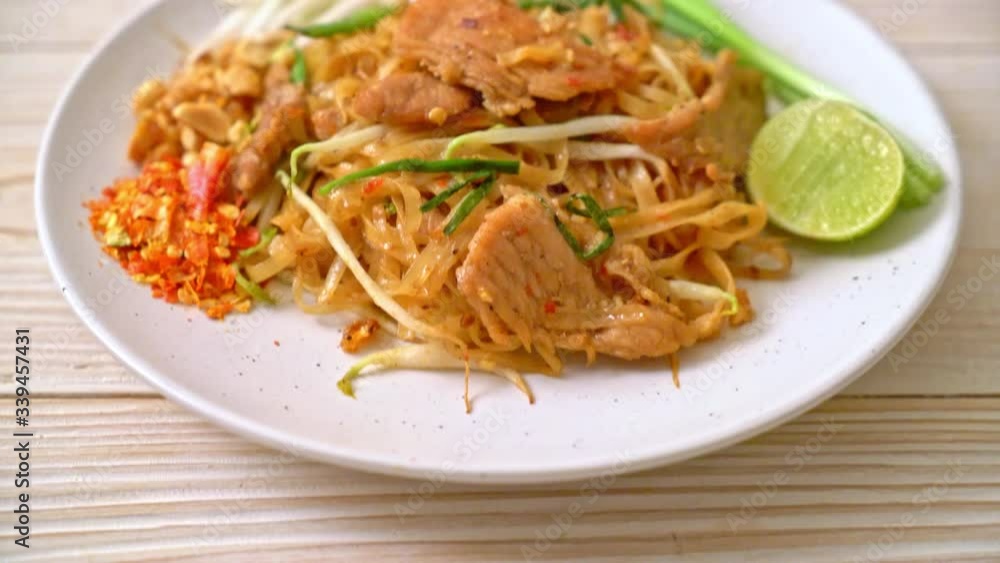 stir-fried rice noodles with pork in Asian style stir-fried rice noodles with pork in Asian style