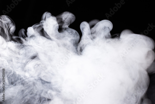 White steam on a black background.