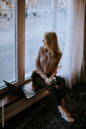 Young woman working on lapt...
