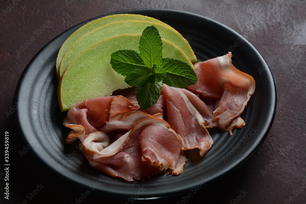 Italian prosciutto crudo or jamon. Raw ham
Italian prosciutto crudo or jamon. Raw ham
