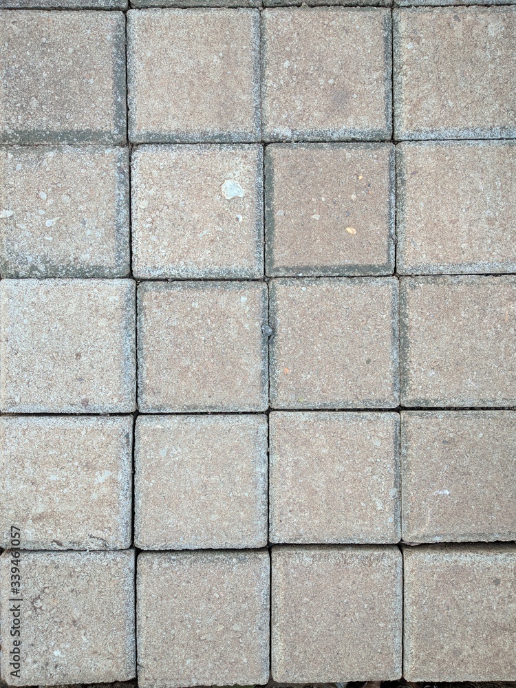 close up street cement block background textured. good for background or wallpaper. close up street cement block background textured. good for background or wallpaper.
