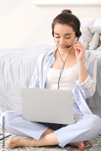 Beautiful young woman worki...