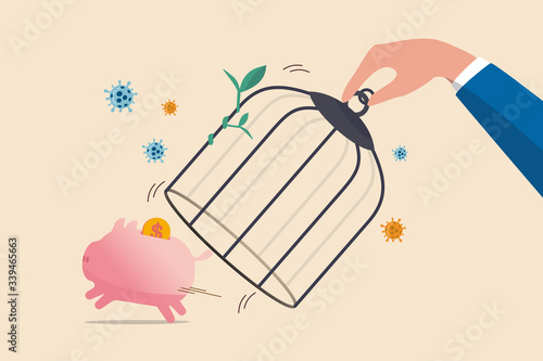 Reopen economy after Coronavirus lockdown, restart business in normal operation after peak of Coronavirus COVID-19 outbreak concept, government hand unlock the cage free piggybank with dollar money.
