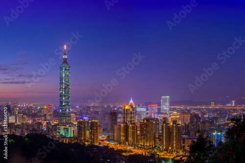 View of Taipei City skyscrapers at night from Elephant or Xiangshan mountain. Landmark of Taiwan. Cityscape in twilight time, Teipei. Taiwan