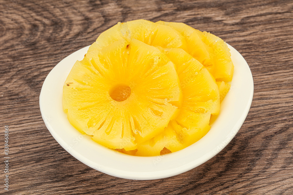 Marinated pineapple rings in the bowl Marinated pineapple rings in the bowl