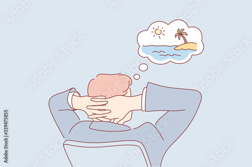 Office work, dream, summer vacation, business concept. Young businessman boy clerk manager working at office and dreaming about summer vacation at sea, ocean coast. Waiting for holiday, travelling.