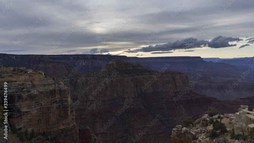 A wide sunset timelapse looking down into the Grand Canyon from Moran Point. The sky lights up with beautiful pink and orange colours shortly after sunset. A wide sunset timelapse looking down into the Grand Canyon from Moran Point. The sky lights up with beautiful pink and orange colours shortly after sunset.
