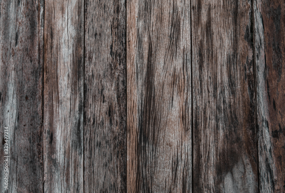 Top view of black and brown wooden texture background. Background with horizontal patterns of planks. Top view of black and brown wooden texture background. Background with horizontal patterns of planks.