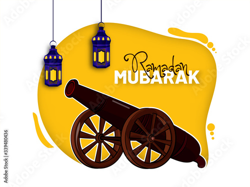 The Muslim feast of  the holy month of Ramadan Kareem. Ramadan Kareem minimal greeting card abstract background template with cannon and hanging lantern fanus.