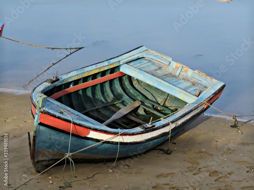 Canvas Print Rowboat Moored On Shore