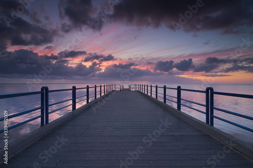 Morning at the seaside during sunrise and pier