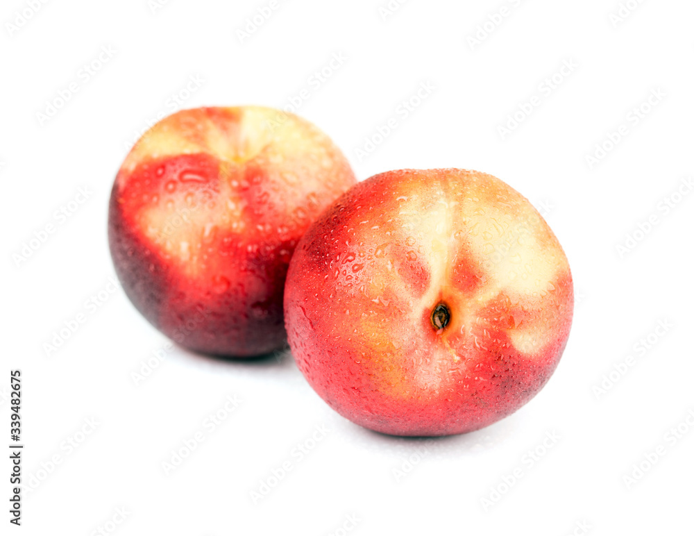 Fresh raw nectarine isolated on white Fresh raw nectarine isolated on white