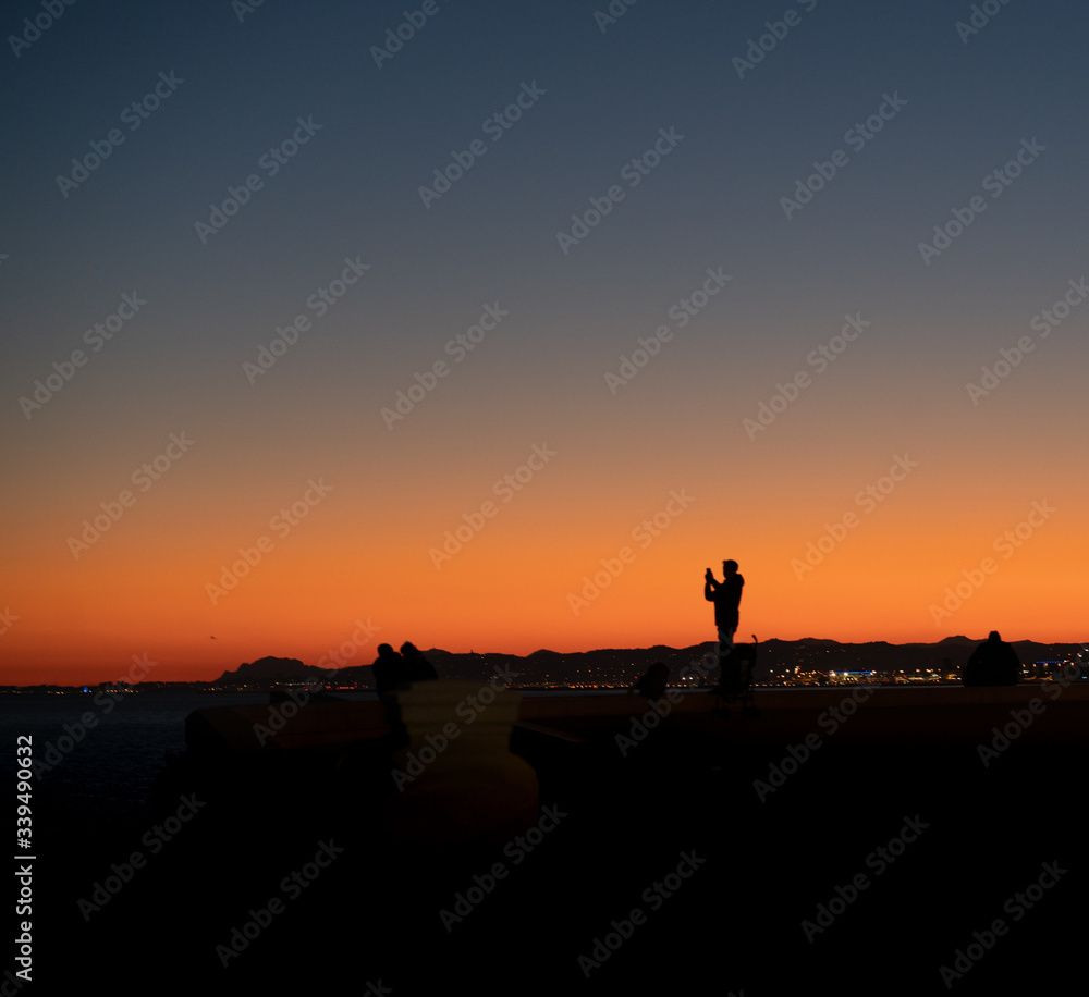 silhouette of a man on the beach