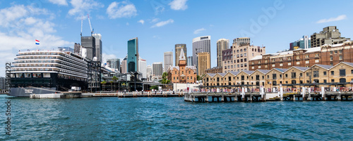 Sydney city centre view. Panoramic harbor photo with cruise ship and skyscrapers. 