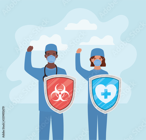 man and woman doctors heroes with shields against 2019 ncov virus vector design