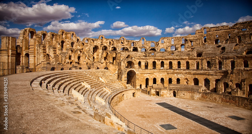 The impressive ruins of the largest colosseum in North Africa, a huge Roman amphitheater in the small village of El Jem, Tunisia. UNESCO World Heritage Site