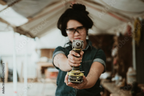 Edgy female carpenter