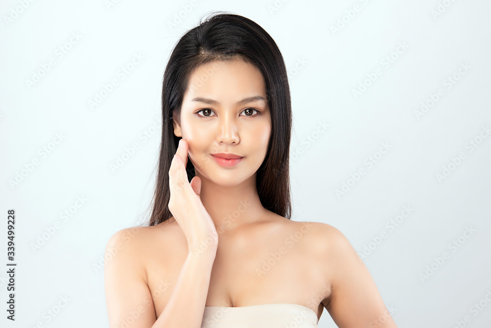 Beautiful Young Asian Woman with Clean Fresh Skin. Face care, Facial treatment, Cosmetology, beauty and healthy skin and cosmetic concept, woman beauty skin isolated on white background Beautiful Young Asian Woman with Clean Fresh Skin. Face care, Facial treatment, Cosmetology, beauty and healthy skin and cosmetic concept, woman beauty skin isolated on white background