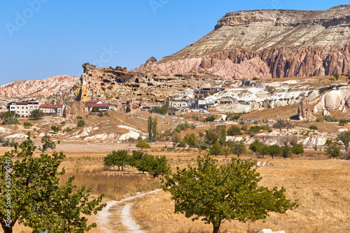 Cavusin township and ruined castle in Cappadocia © vladimirzhoga