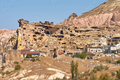 The ruins of Cavusin castle and old cemetery in Cappadocia