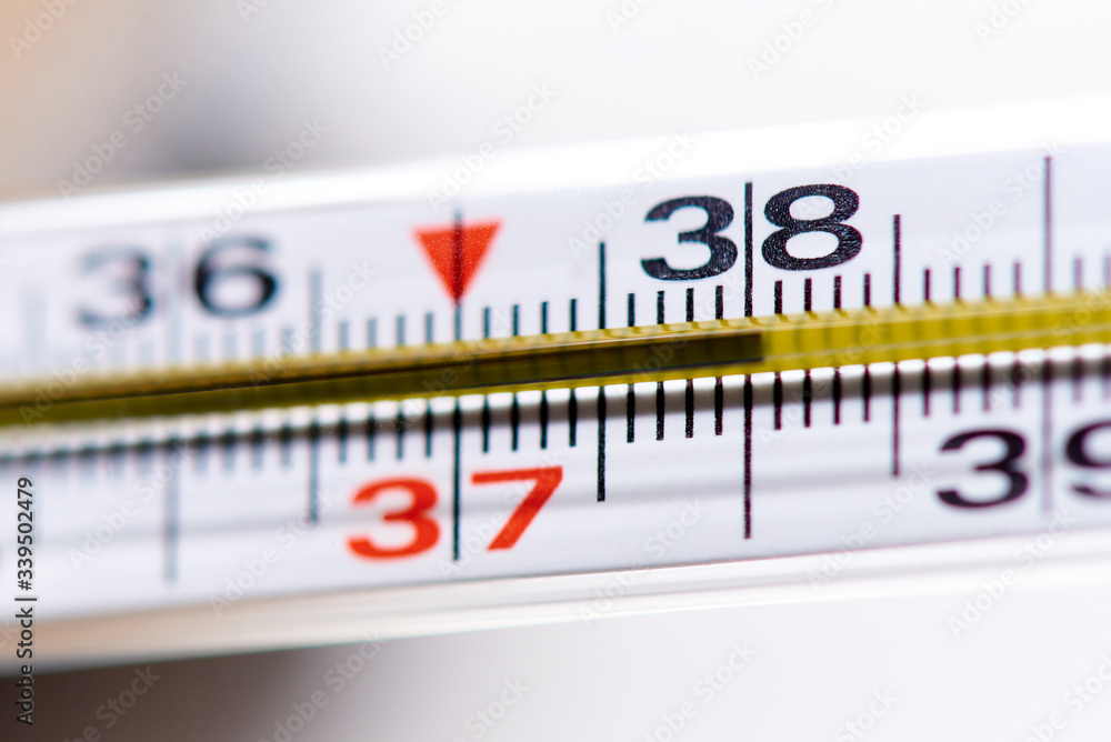 Thermometer with a temperature of 38 close-up. Thermometer with a temperature of 38 close-up.