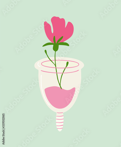 Eco-friendly, washable menstrual cup with flower and blood.