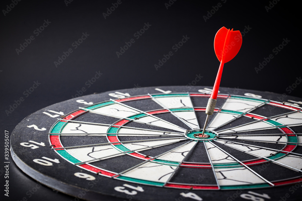 Dart board is the target and goal. Success hitting target aim goal achievement. Dart board is the target and goal. Success hitting target aim goal achievement.