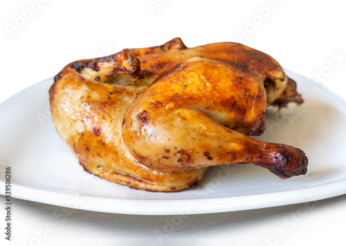 whole roasted chicken isolated on white background