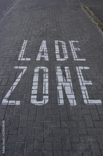 Obraz na płótnie Loading zone marked on a street
w salonie