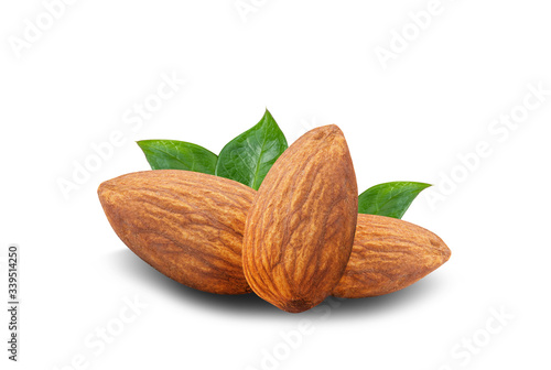 almonds with green leaves isolated on white background