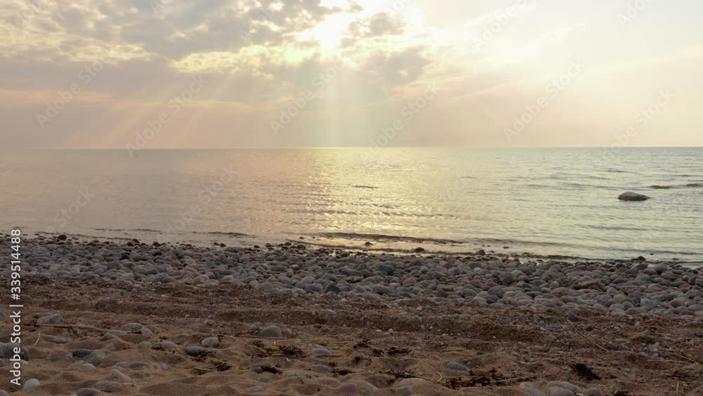 Beautiful amazing sunrise or sunset with reflection on water, sun lights. Orange colors calm sea. Nature background with idyll scene. Relaxation, tourism concept Beautiful amazing sunrise or sunset with reflection on water, sun lights. Orange colors calm sea. Nature background with idyll scene. Relaxation, tourism concept